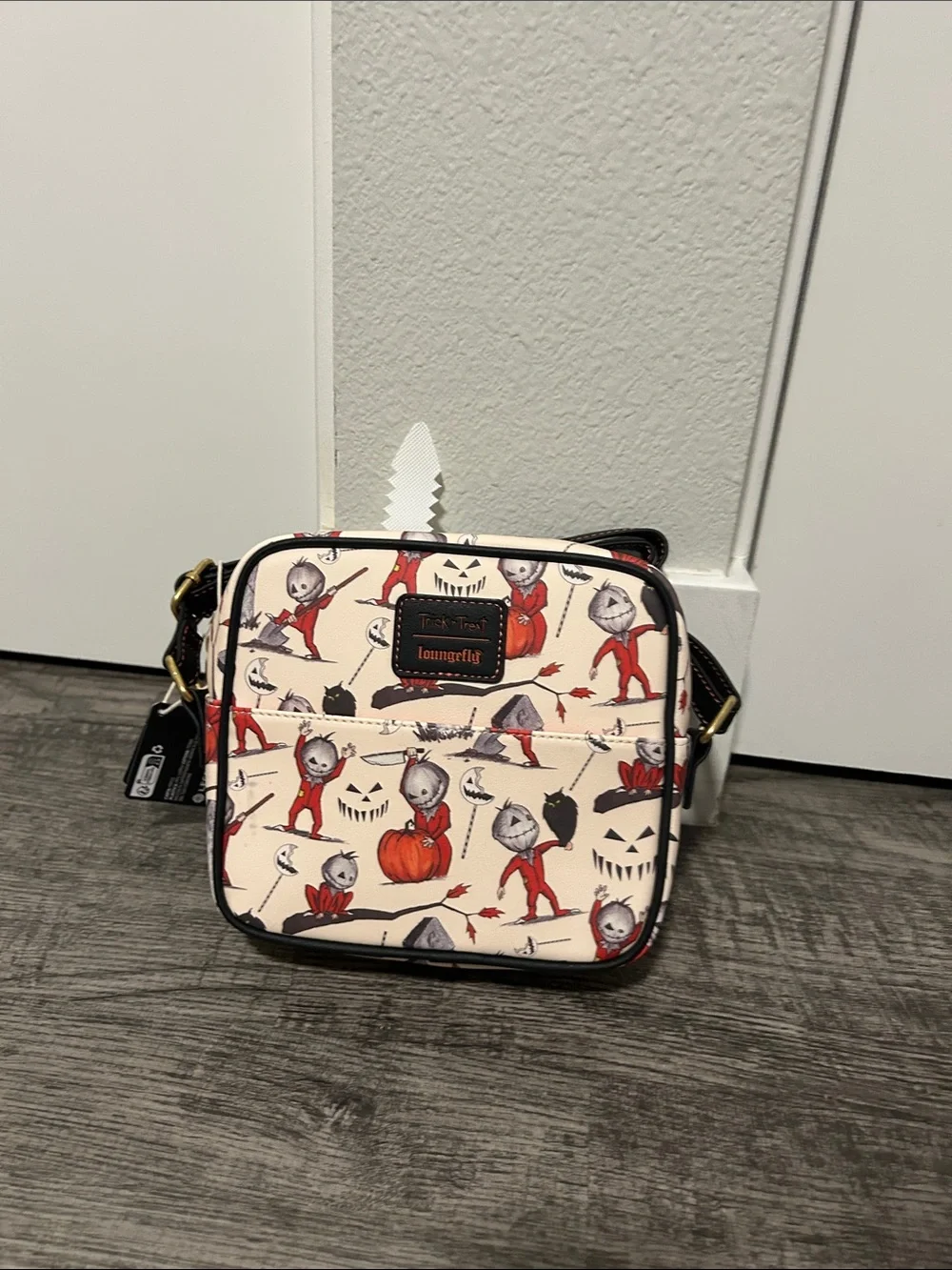 Loungefly Cream Crossbody Bag with Red Halloween Character Print